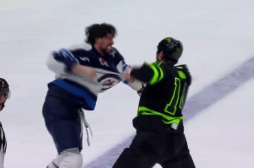 Jamie Benn drop the gloves with Brenden Dillon