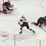 Cody Glass scores a goal against the Carolina Hurricanes