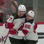 Dougie Hamilton scores a goal against the Carolina Hurricanes