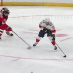 Evan Rodrigues scores a goal against the New Jersey Devils