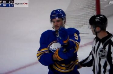 Penguins' Owen Pickering roughs Sabres' Josh Norris after being cross checked