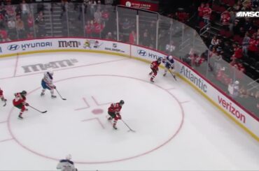 Curtis Lazar scores a goal against the New Jersey Devils