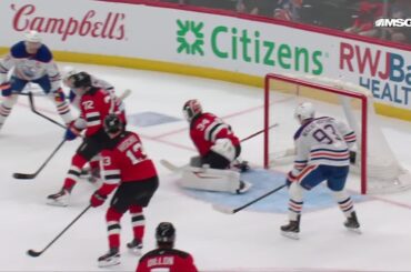 Ryan Nugent-Hopkins scores a goal against the New Jersey Devils