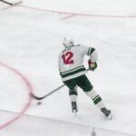 Matthew Boldy scores a goal against the New Jersey Devils