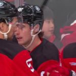 Jack Hughes scores a goal against the Colorado Avalanche