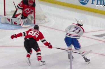 Jake Evans scores a goal against the New Jersey Devils