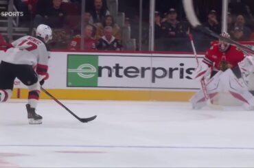 Simon Nemec scores a goal against the Chicago Blackhawks