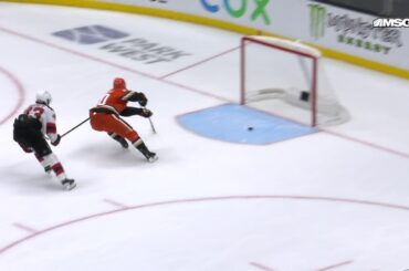 Chris Kreider scores a goal against the New Jersey Devils