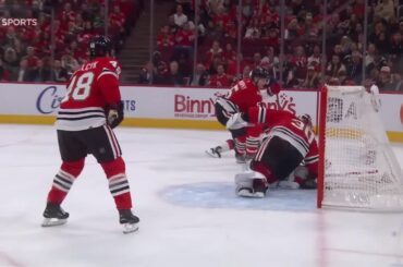 Dawson Mercer scores a goal against the Chicago Blackhawks