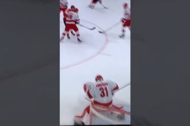 #31 Frederik Anderson uses his Goalie mask to make a save.