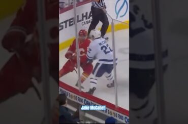 McCabe with a Thunderous hit!! Leafs vs Flames #shorts #nhl #hockey