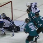 Hutchinson kicks puck into his own net after lucky bounce