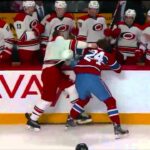 Jarred Tinordi checks and fight against Hurricanes 2013-09-21