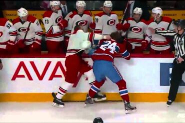 Jarred Tinordi checks and fight against Hurricanes 2013-09-21