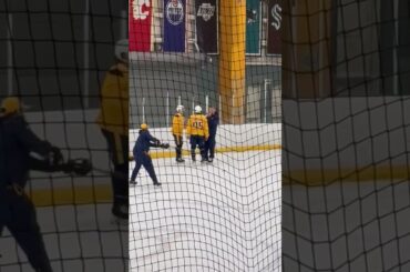 Coach Mark Borowiecki giving fighting lessons to Cam Reid & Tristan Sarsland at Preds camp 2025