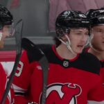 Thatcher Demko scores a goalie save against the New Jersey Devils