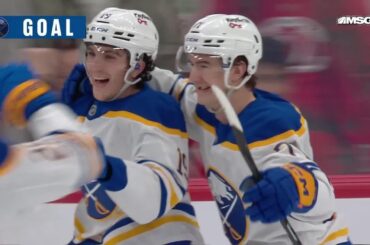 Peyton Krebs scores a goal against the New Jersey Devils