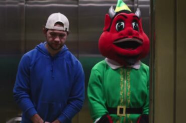 NJ Devil and Paul Cotter recreate the elevator scene from Elf