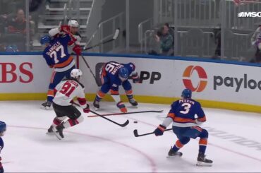 Brett Pesce scores a goal against the New York Islanders