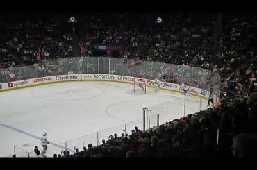 Laval Rocket's Kaapo Kähkönen stops Rochester Americans' Jagger Joshua on a shorthanded breakaway