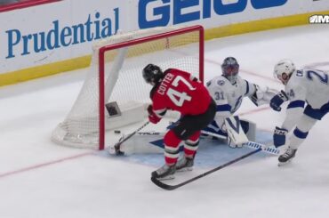 Paul Cotter scores a goal against the Tampa Bay Lightning