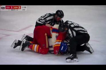 NHL Hockey fight - Trent Frederic(Oilers) vs. Kevin Bahl(Flames)