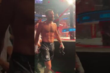 Daniel Cormier hugs Luke Rockhold as he leaves the Octagon #UFC278