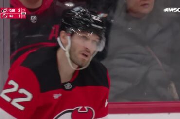 Logan Stankoven scores a goal against the New Jersey Devils