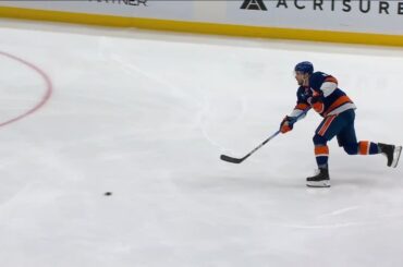 Mat Barzal scores a goal against the New York Islanders