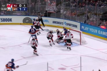 Anthony Duclair scores a goal against the New Jersey Devils