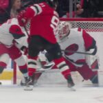 Dawson Mercer scores a goal against the Carolina Hurricanes