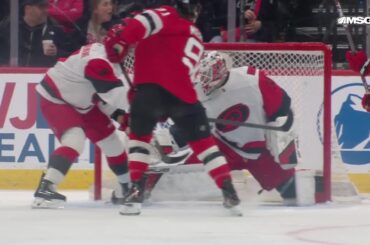 Dawson Mercer scores a goal against the Carolina Hurricanes