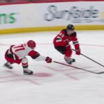 Taylor Hall scores a goal against the New Jersey Devils