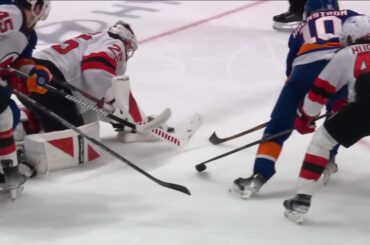 Simon Holmstrom scores a goal against the New Jersey Devils