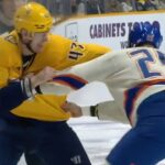 Oilers' Darnell Nurse And Predators' Michael McCarron Square Off After Opening Puck Drop