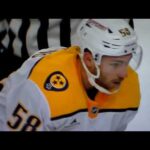 Predators' Michael Bunting upends Golden Knights' Braden McNabb with huge hit, McNabb leaves ice