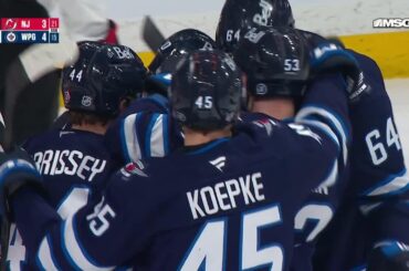 Tanner Pearson scores a goal against the New Jersey Devils