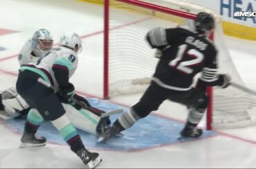 Cody Glass scores a goal against the Seattle Kraken