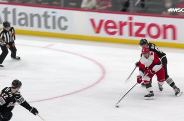 Andrei Svechnikov scores a goal against the New Jersey Devils