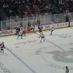 Laval Rocket's Xavier Simoneau gets a high stick in the face from Belleville Senators' Jamieson Rees