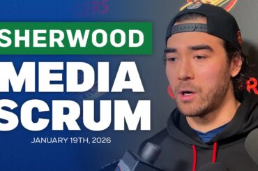 Canucks’ Kiefer Sherwood speaks with media after being traded to the San Jose Sharks