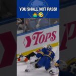 Stopping pucks AND players! 🤣