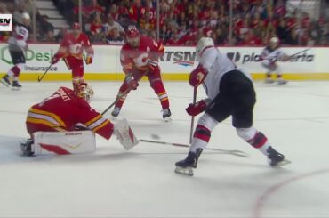 Simon Nemec scores a goal against the Calgary Flames