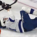 Brayden Point scores on the power play but is helped off the ice after being injured on the play.