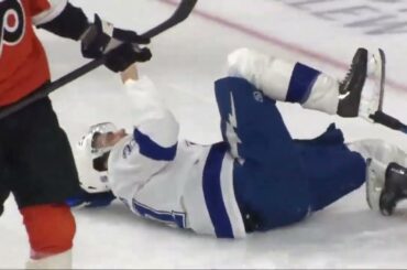 Brayden Point scores on the power play but is helped off the ice after being injured on the play.