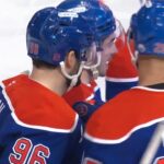 Matt Savoie scores a goal against the New Jersey Devils