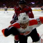 Orlov takes Giroux hard into boards face-first