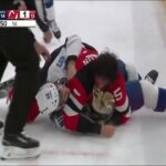 Brenden Dillon takes exception to a hit from Scott Sabourin and gets fed fists