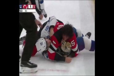 Brenden Dillon takes exception to a hit from Scott Sabourin and gets fed fists