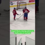 Coach Marty sharing advice to Slafkovsky & Caufield